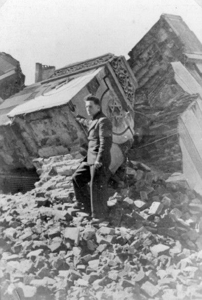 Mendel Grosman on the ruins of the synagogue on Wolborska Street in the Lodz ghetto.